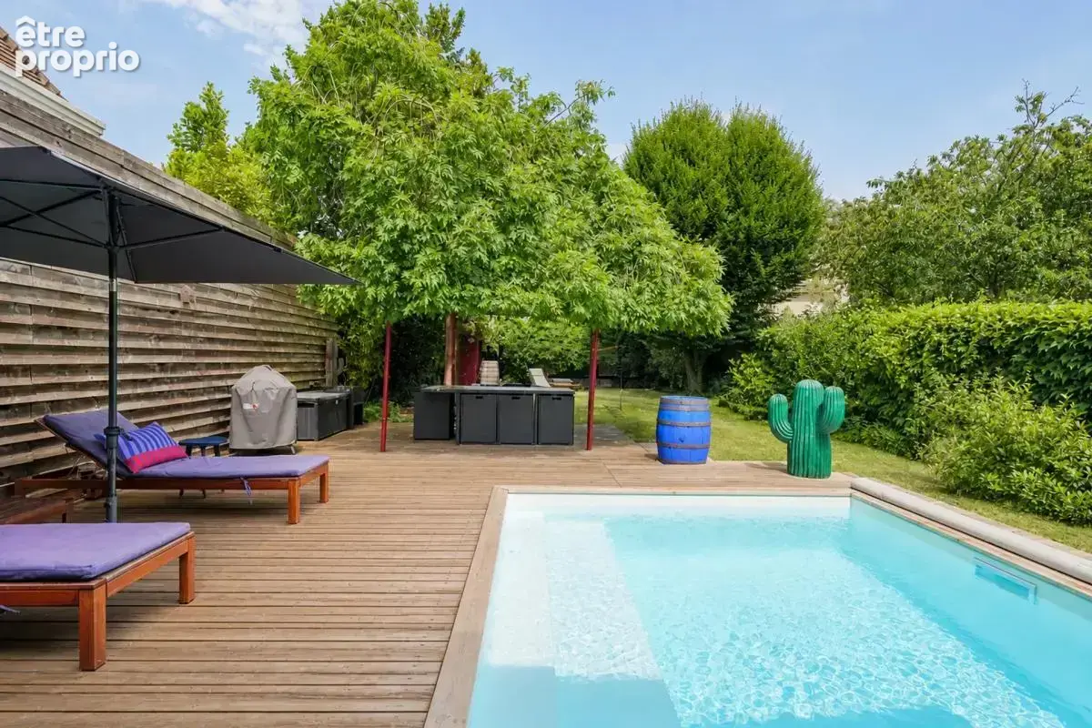 Maison 7 pièces 127 m² à Gagny avec piscine, jardin et parkings - photo 13
