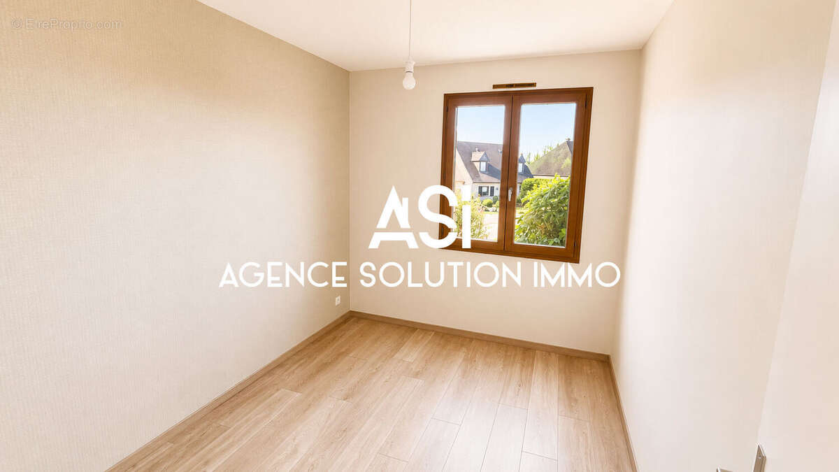 Maison de plain-pied avec sous-sol complet - Actuellement louée - photo 4