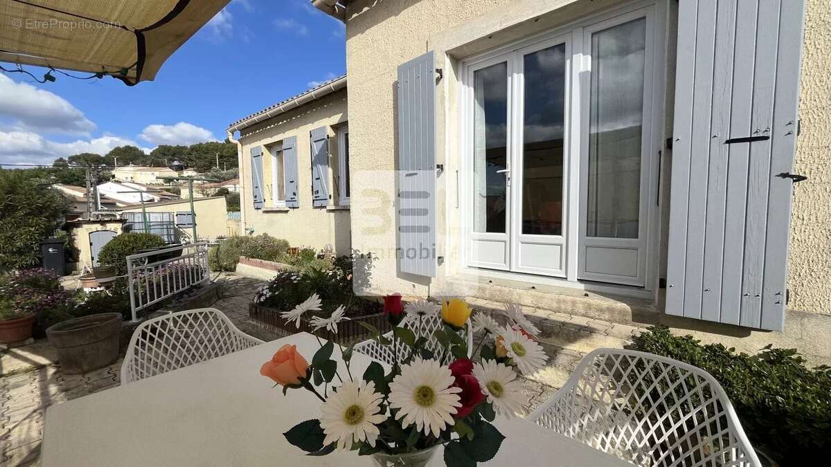 Maison à LAUDUN-L'ARDOISE