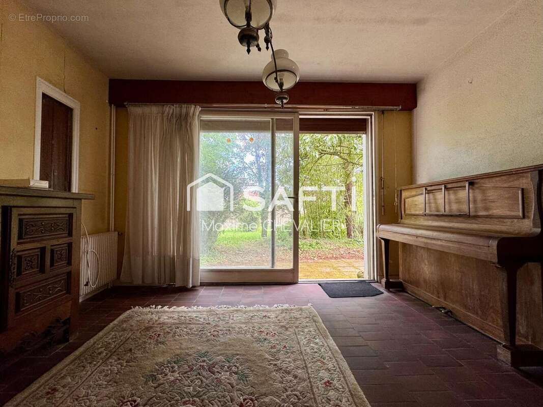 Photo 3 - Maison à NEUVY-SAINT-SEPULCHRE