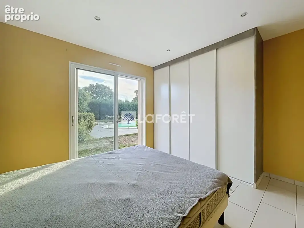 Élégante maison de plain-pied avec piscine chauuffée - photo 16