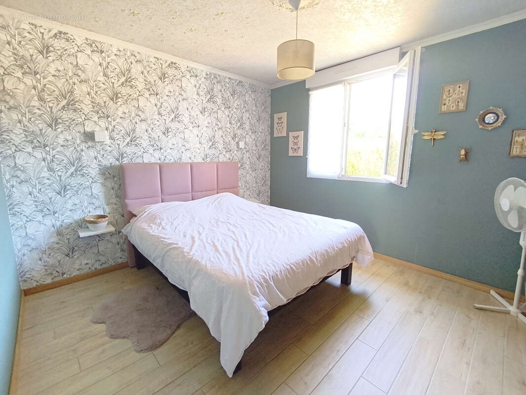 Maison plain-pied 3 chambres et triple garage - photo 11