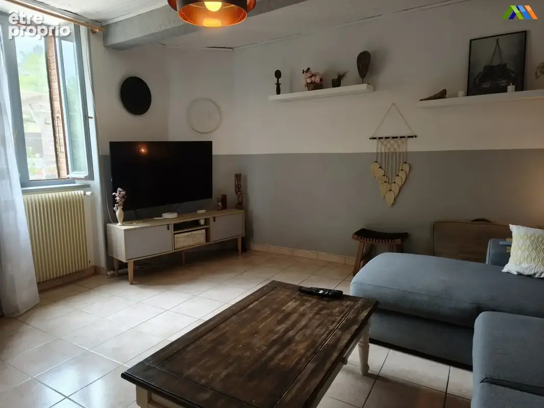 Comfortable reception room with natural light and views over the garden