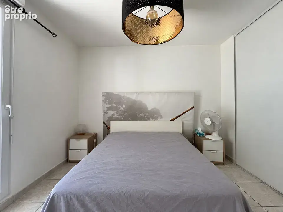 Appartement T3 65.88m² en rez de jardin avec stationnement - photo 9