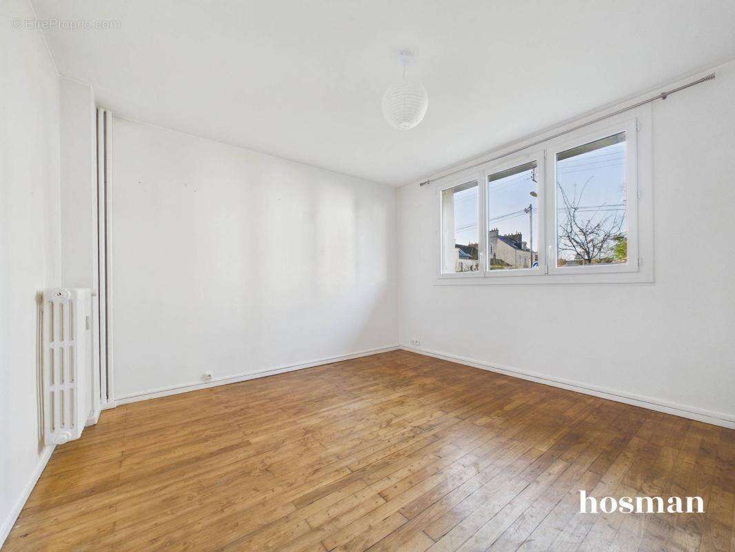 Ravissant appartement T3 de 56 m2 avec garage boxé et cave - Rue du Port Guichard, Quartier Saint-Donation / Tortière à Nantes - photo 7