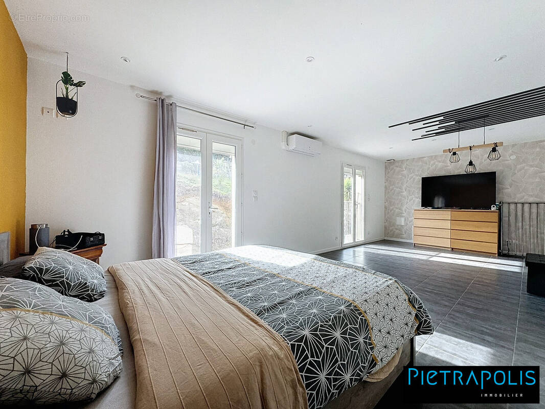 Maison à PONT-EVEQUE