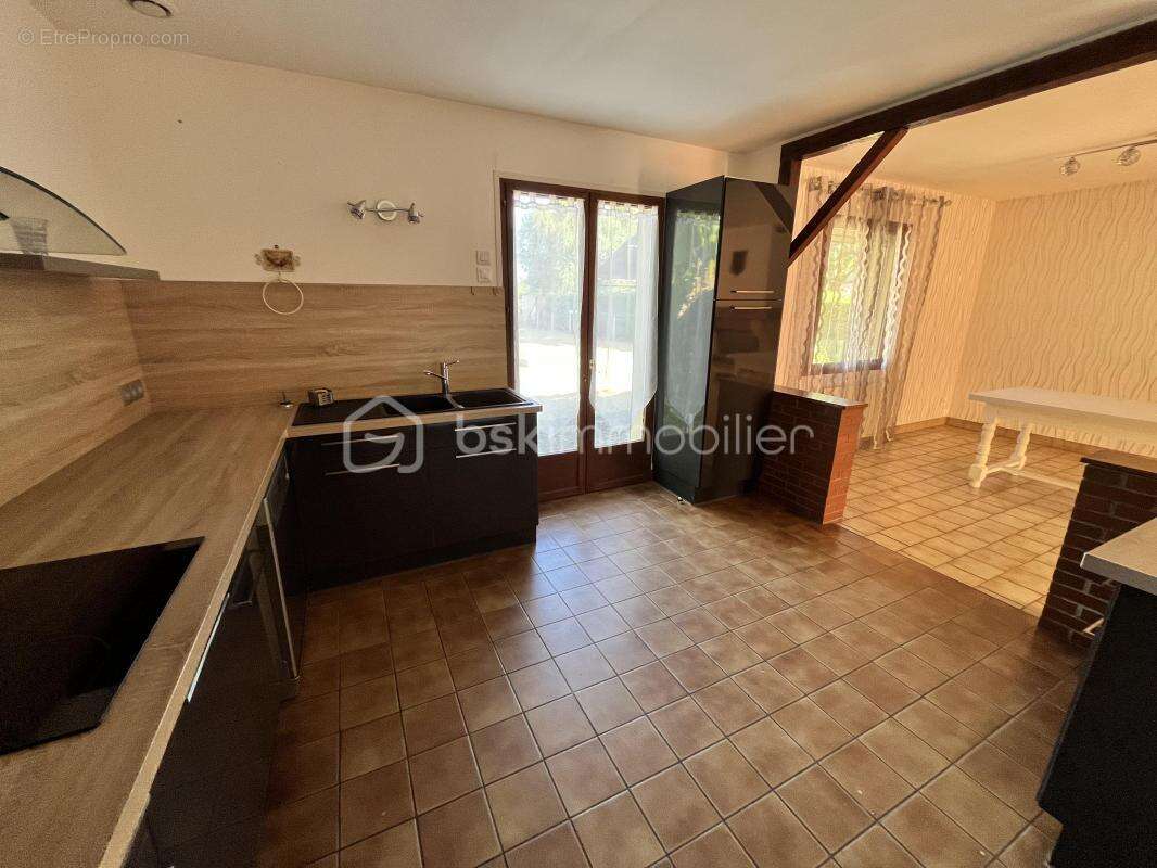 Charmant pavillon de plain-pied sur sous-sol complet avec garage et terrain - photo 11