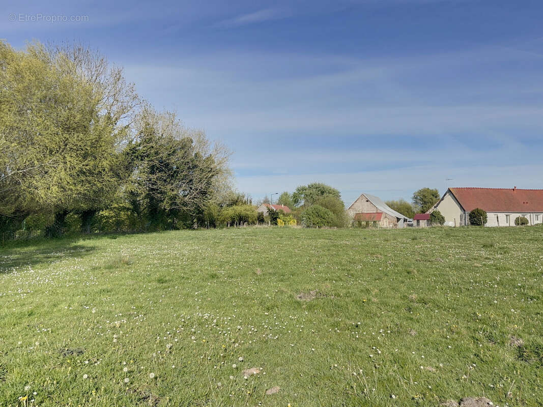Terrain à SAINT-QUENTIN-EN-TOURMONT