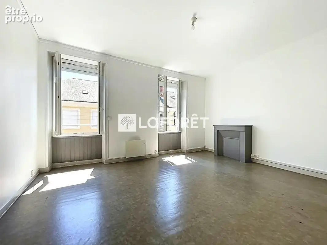 A deux pas de la gare et de la Place de la Visitation T3 de 65m² - photo 5