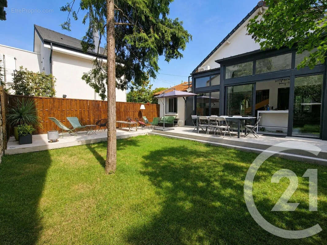 Maison 115 m² à Saint-Maur-Des-Fosses  - photo 12
