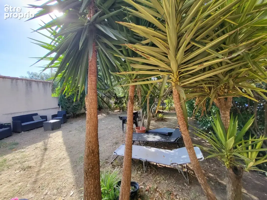 A vendre -  appartement de plain pied avec jardin et 2 place - photo 5