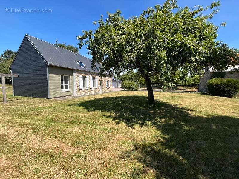 Havre de paix : Maison en pierre rénovée et son verger de 150 pommiers — Rare sur le marché - photo 23