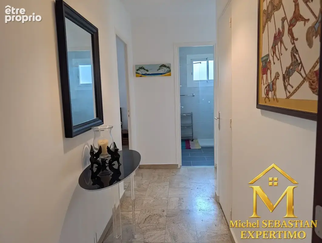 EXCLUSIVITE ! Appartement 3P rénové avec parking et cave - Centre Ville - photo 9