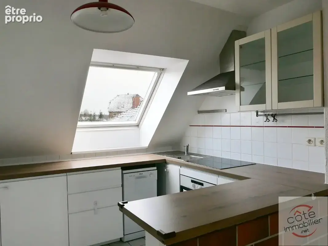 Appartement sous combles dans maison individuelle comprenant trois appartements - photo 7