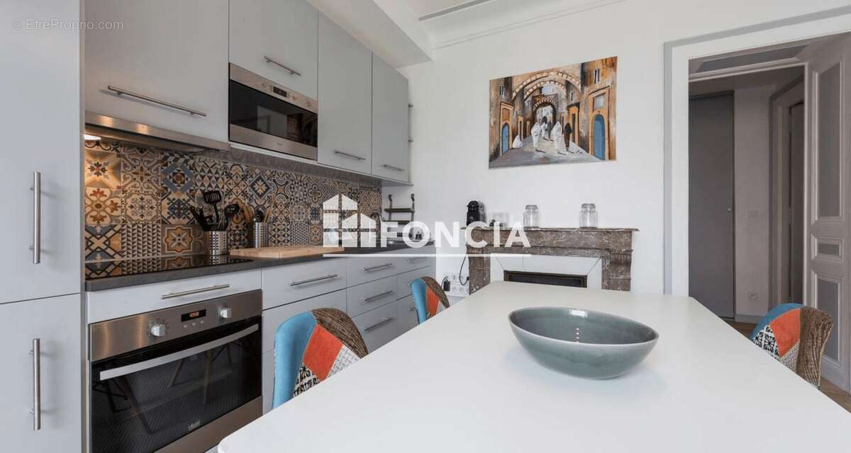 Annecy centre – T4 traversant de 84 m², balcons, parking et cave - photo 9