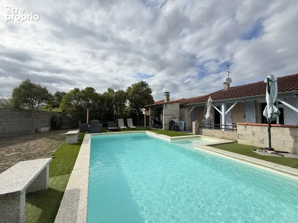 Maison T6 de 114 M2 avec garage, abri voiture, Piscine et terrain de 755 M2 - photo 4