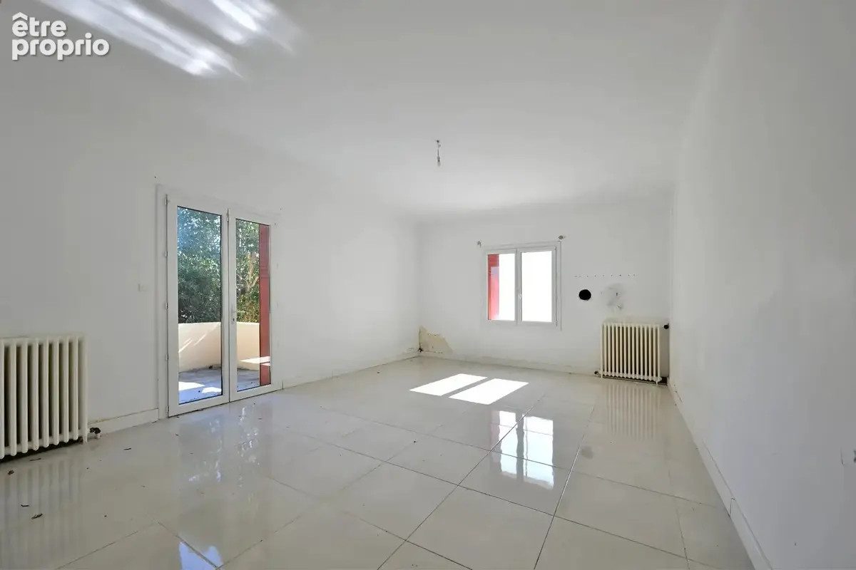 Maison de plain-pied 80 m² avec jardin et garage – Quartier prisé des Alyscamps! - photo 6