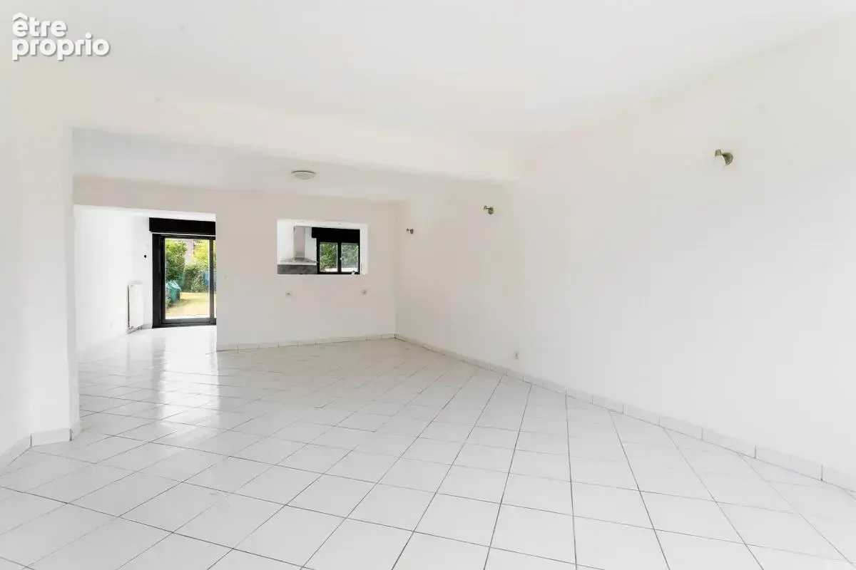 Maison de 6 pièces de 115 m² située à Hem - photo 4