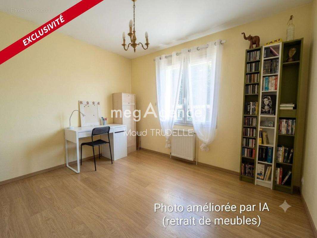 Plain pied au coeur du bourg - photo 7