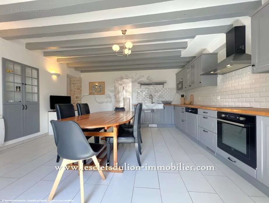 Longére intégralement rénovée par un architecte - photo 11