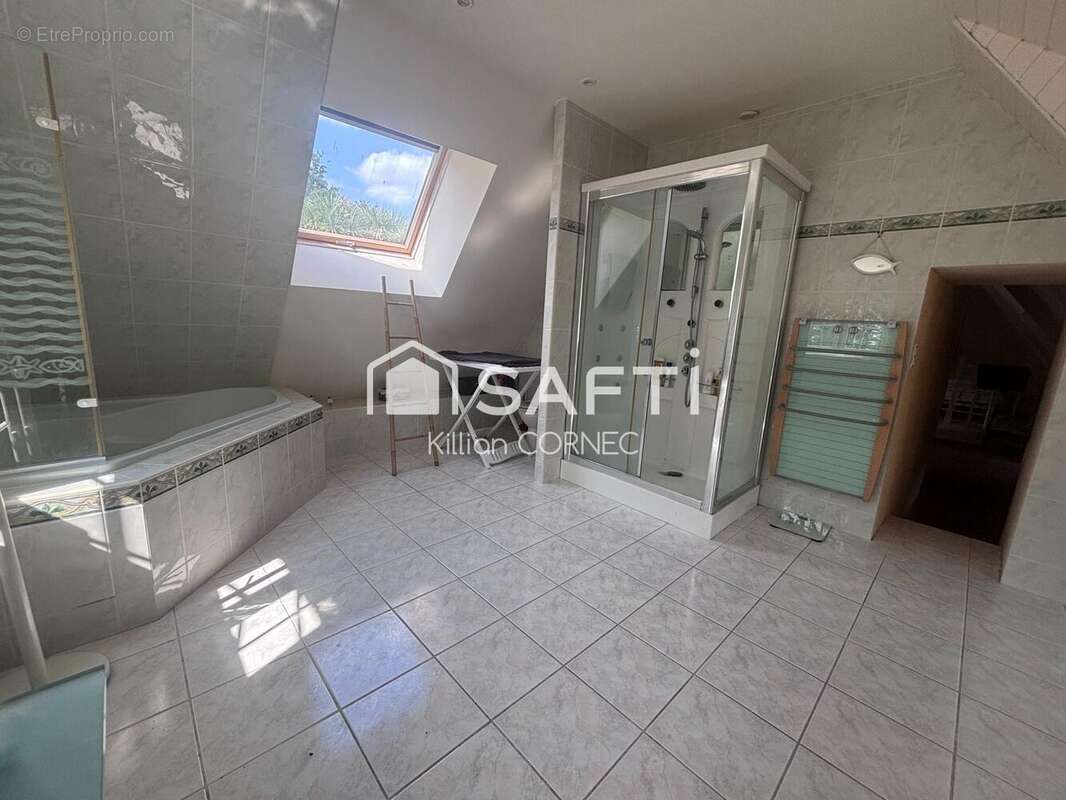 Maison 104 m² à Baud  - photo 9