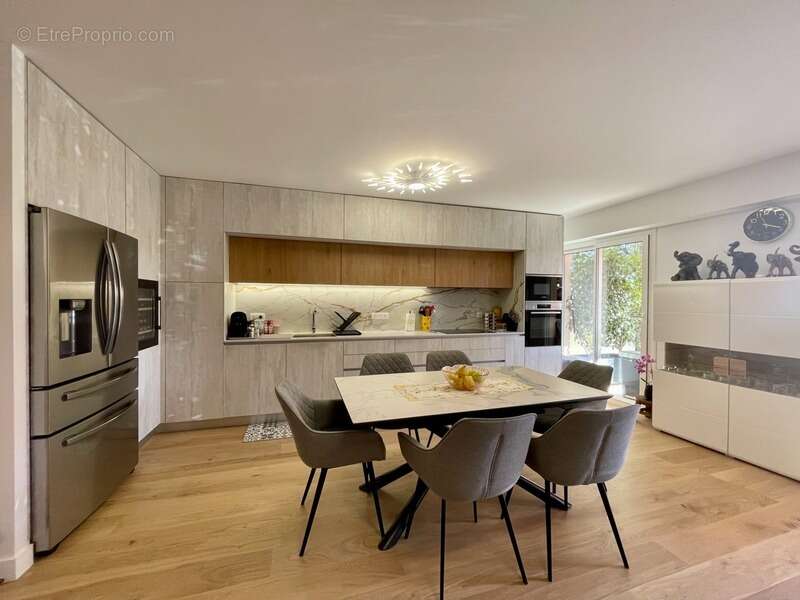Appartement en rez-de-jardin, au calme, rénové - photo 7