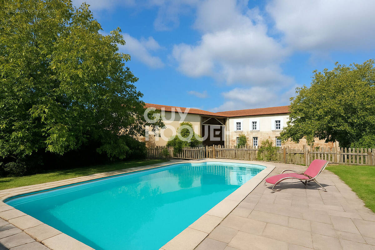 Maison à ESSERTINES-EN-DONZY