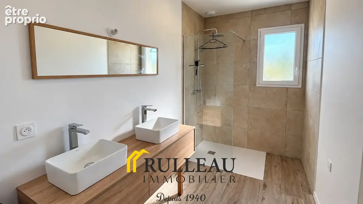 Maison de plain-pied de 108 m2 avec garage, terrain de 1 001 m2 et DPE A à Laruscade - photo 13