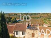 Photo 1 - Maison à ESTEZARGUES