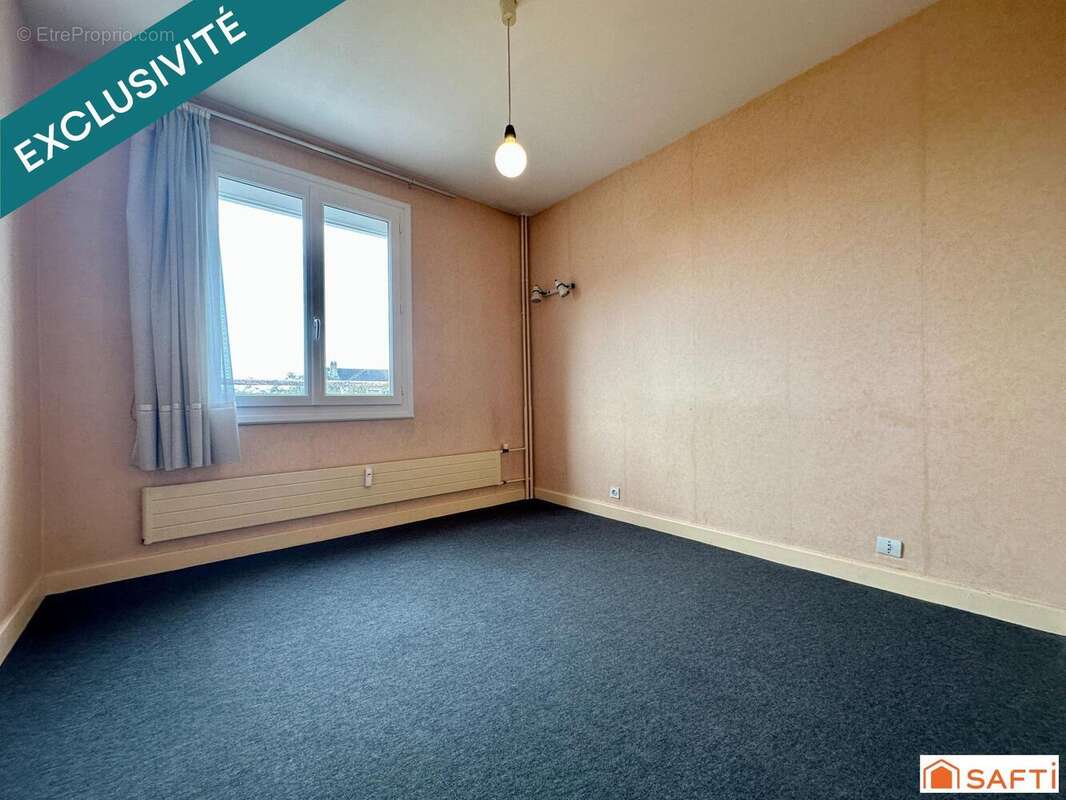 Photo 8 - Appartement à VARENNES-VAUZELLES