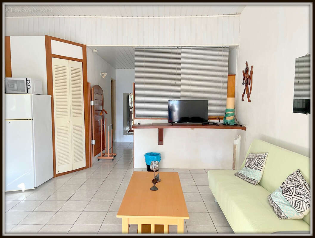A vendre a kourou (97310) une magnifique maison en bois t5 de 106 m² avec 2 maisons t2 independantes - terrain de 775 m² - au pr - photo 14