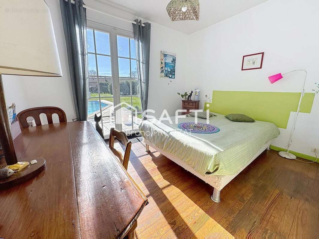 Photo 8 - Maison à SAINT-ETIENNE-DE-TULMONT