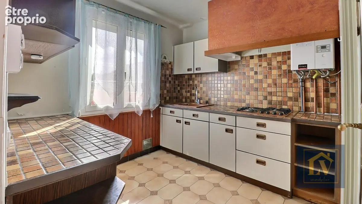 A vendre Maison de 5 pièces en 3 faces avec garage - photo 5
