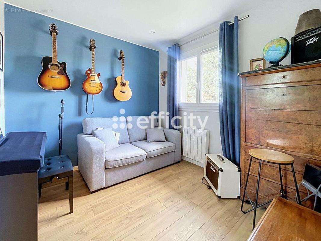 Maison 86 m² à Vaulx-Milieu  - photo 8
