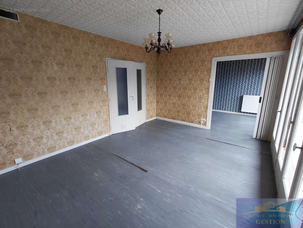 Appartement de type 4 avec cave et garage - photo 2