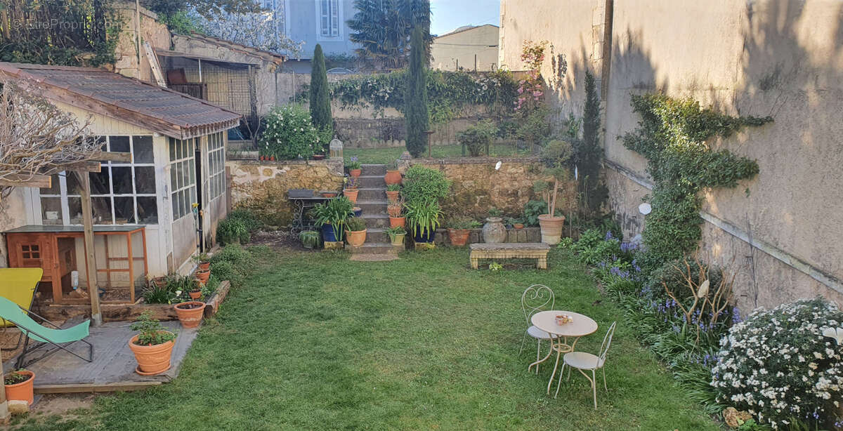 Maison bourgeoise de caractère de 218 m2 avec jardin - photo 17
