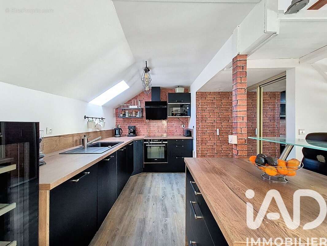 Photo 4 - Appartement à MONTIGNY-LE-BRETONNEUX