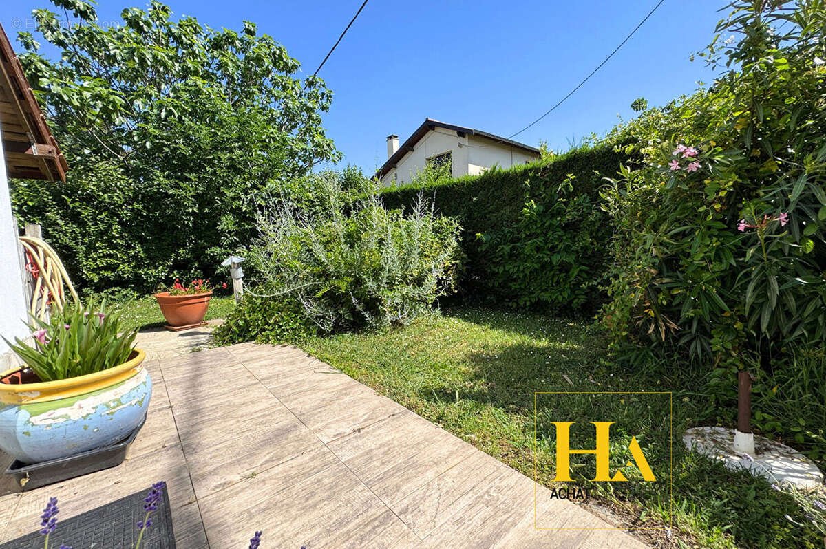 Maison 130 m², 4 chambres, dépendance aménageable, panneaux solaires et jardin - photo 7