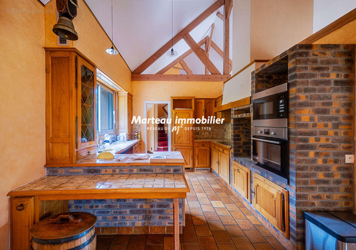 Maison à SAINT-LEONARD-DES-BOIS