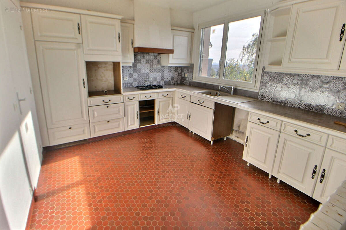 Maison à CHANTELOUP-LES-VIGNES