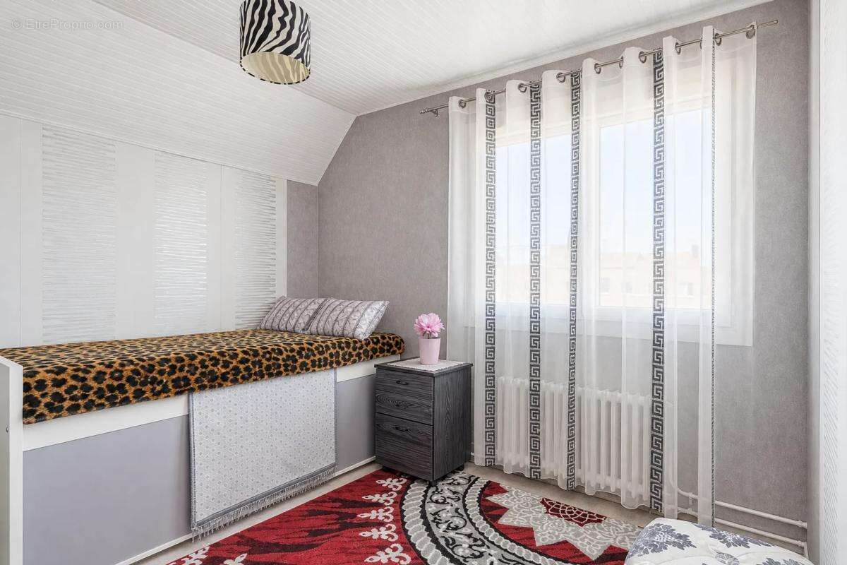 Maison de 5 pièces de 150 m² située à Sainte-Savine - photo 11