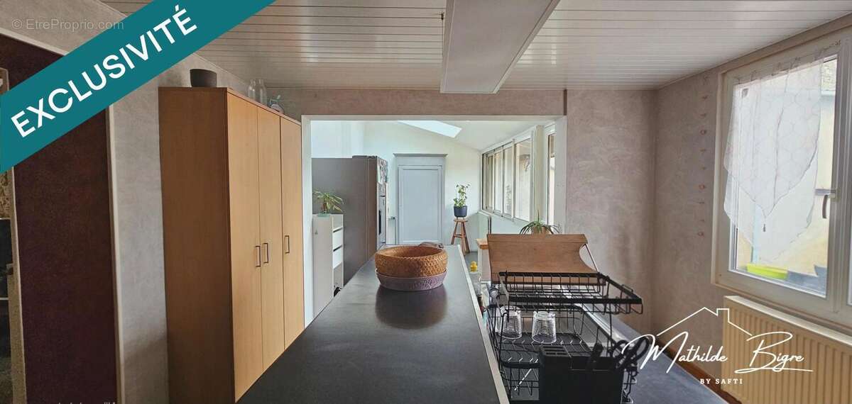 Photo 6 - Maison à LE BREUIL-SUR-COUZE