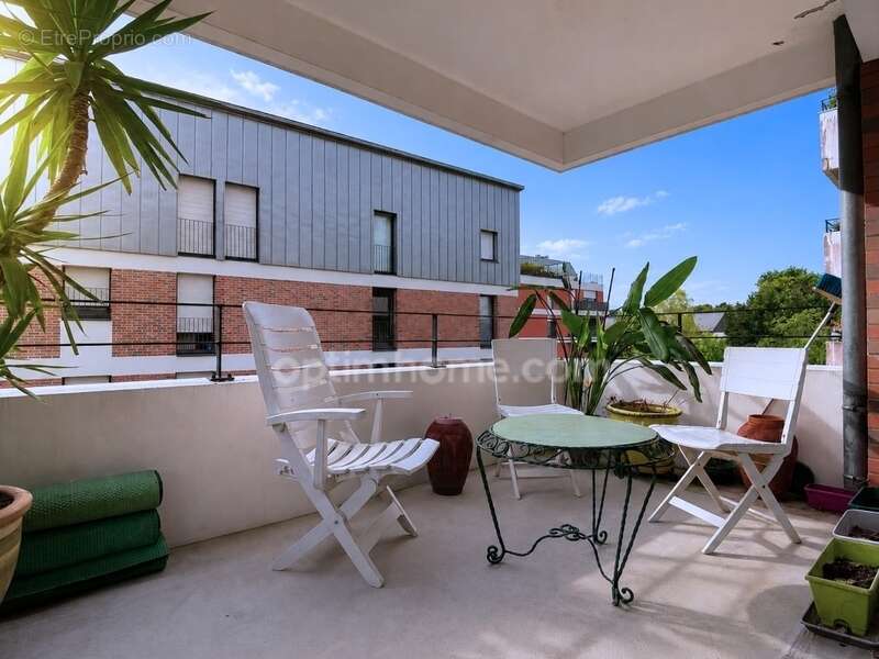 Appartement T5 à vendre à moins de 20 min de Rennes gare – 4 chambres, balcon, garage fermé, parking et cave - photo 2