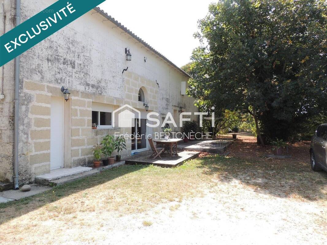 Photo 1 - Maison à COUTRAS