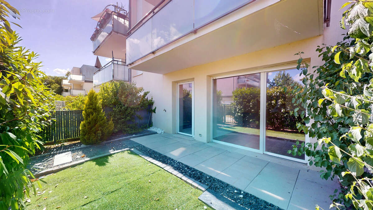 T2 en rez-de-jardin avec terrasse et parking - photo 9