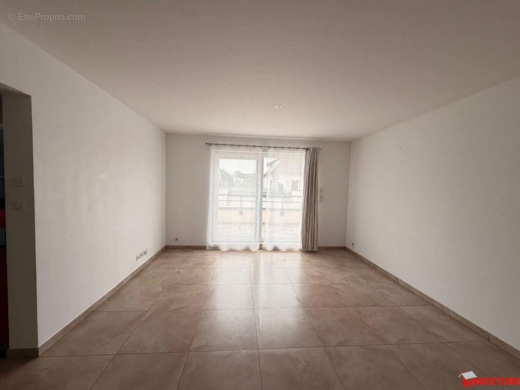 Appartement F4 en Duplex - photo 3