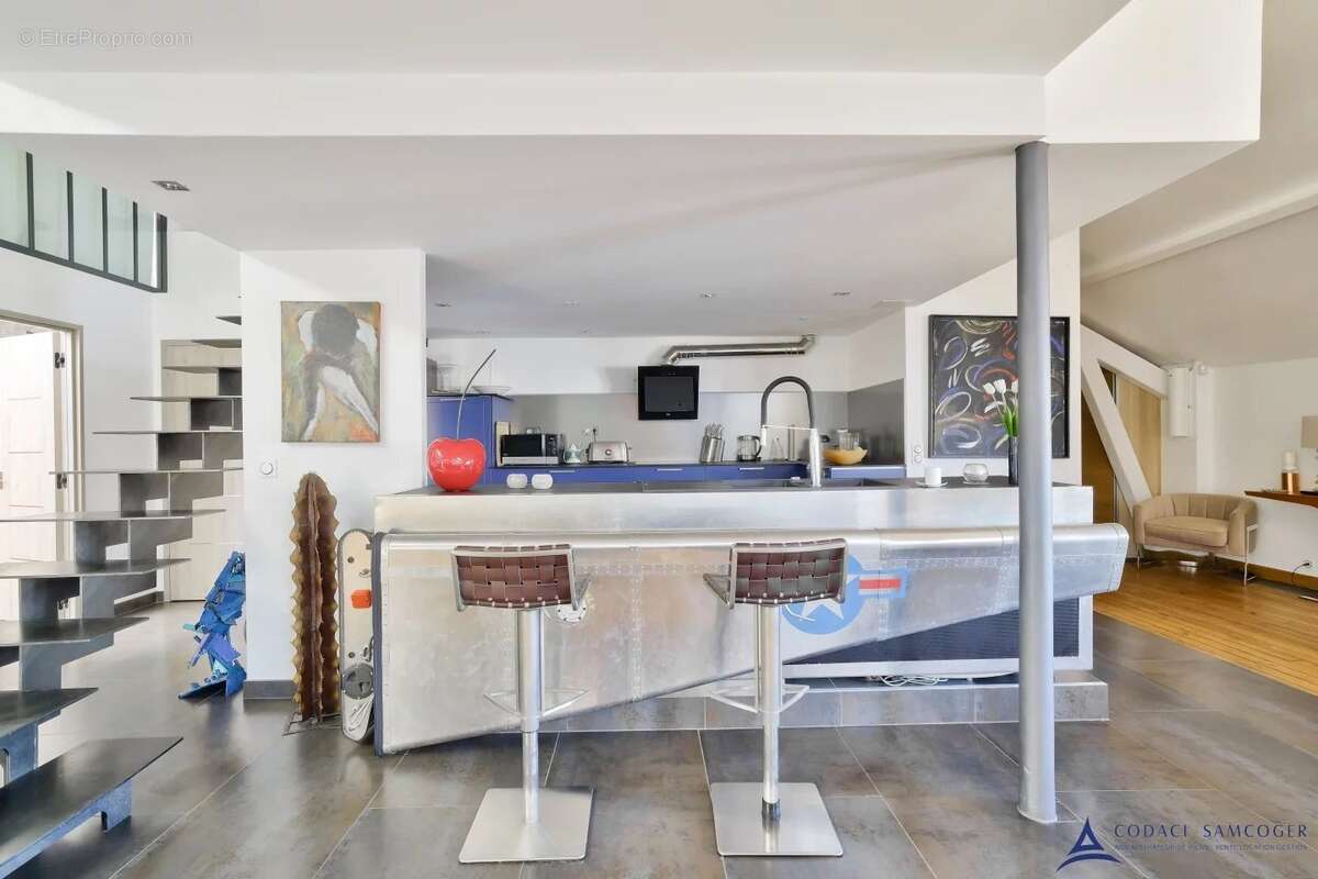 Loft - Quartier Pierre et Marie Curie - Ivry Sur Seine 5 pièce(s) 164.76 m2 - photo 5