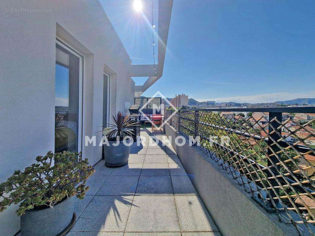 Vente Type 4 dernier étage terrasse de 35 m2 calme vue dégagée 13010 - photo 4