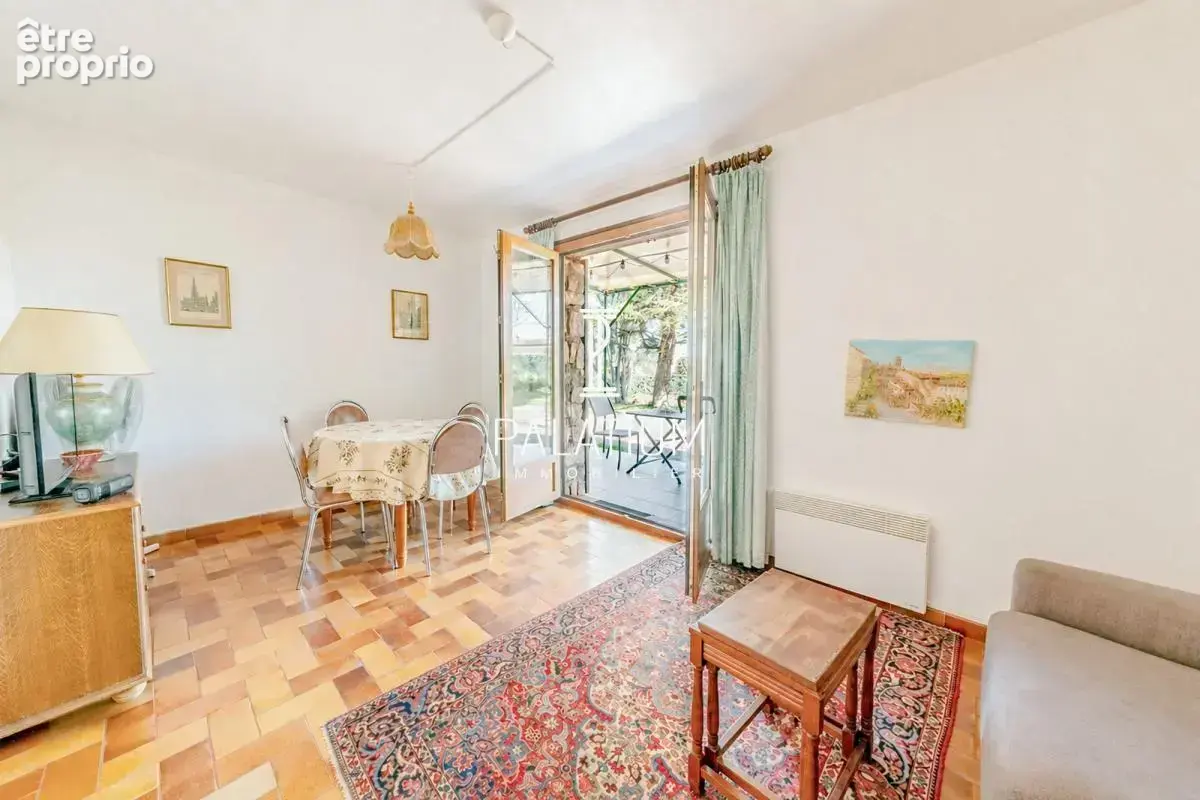 Maison de plain-pied avec jardin arboré et 3 appartements - photo 23