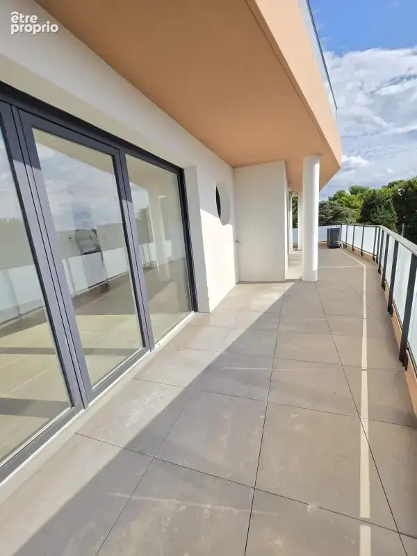 Appartement de type 4 de 105m² + Terrasse de 30m² + 2 parkings - photo 2